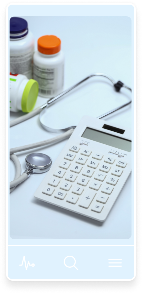 A sthethoscope, calculator and drug container on a table