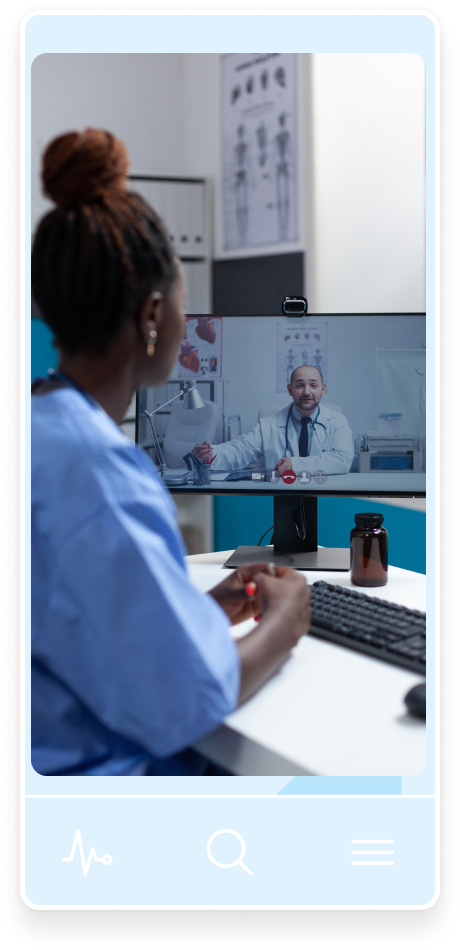 A nurse conversing with a doctor via a video call on a computer